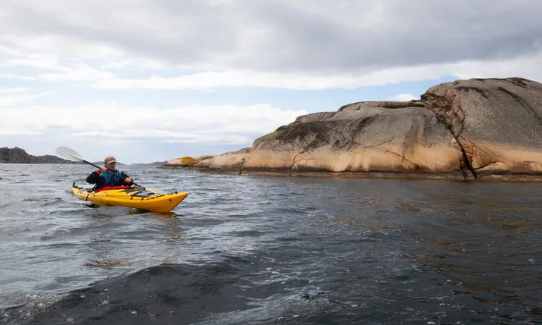  promontory headland head foreland paddle boat paddle canoe seashore coast seacoast sea-coast-0