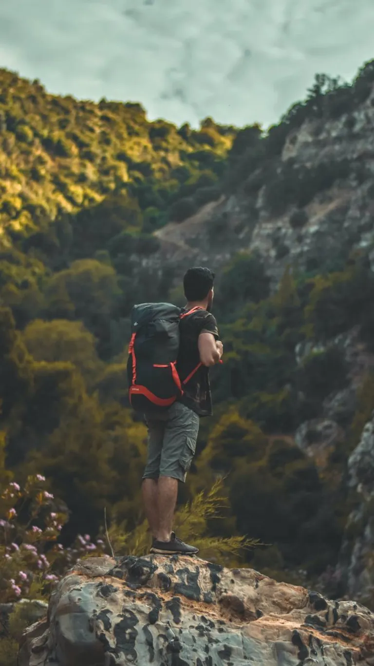  cliff drop drop-off backpack back pack knapsack packsack rucksack haversack valley vale promontory headland head foreland-0