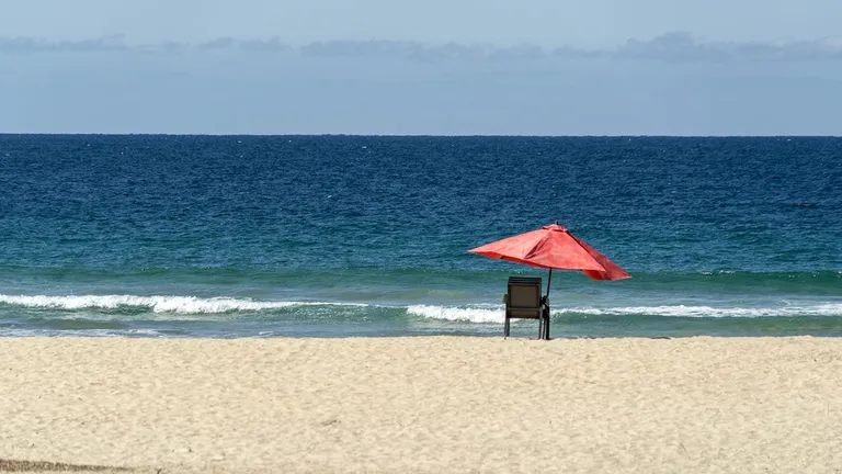  seashore coast seacoast sea-coast umbrella sandbar sand bar folding chair-0